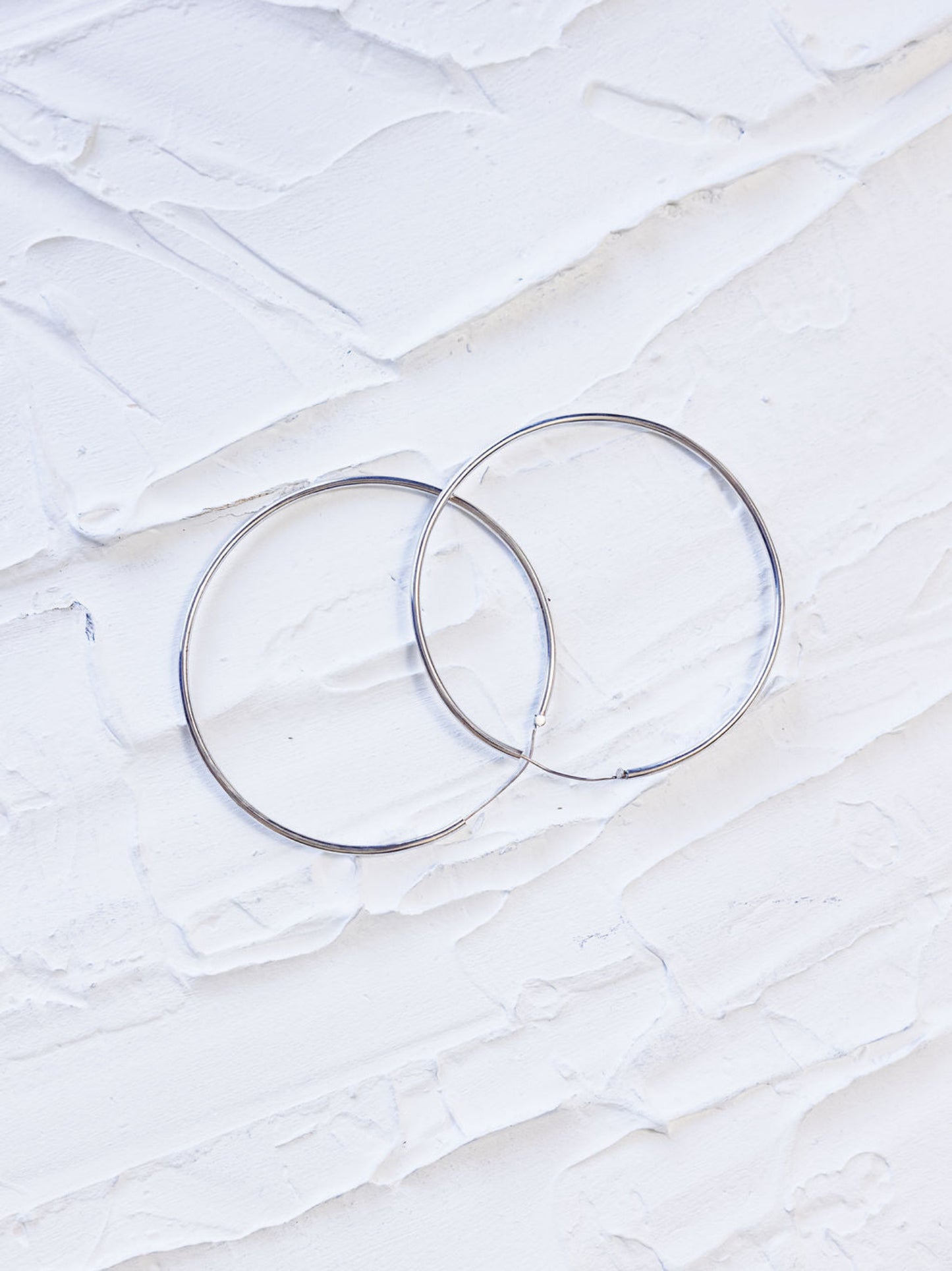 RIVER + SPIRIT HOOPS IN SILVER